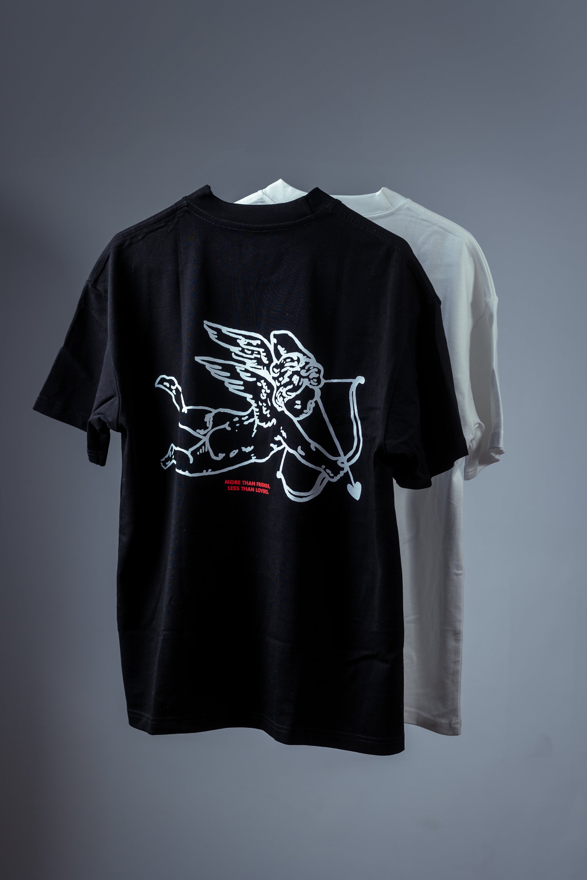 "MORE THAN FRIENDS LESS THAN LOVERS" TEE