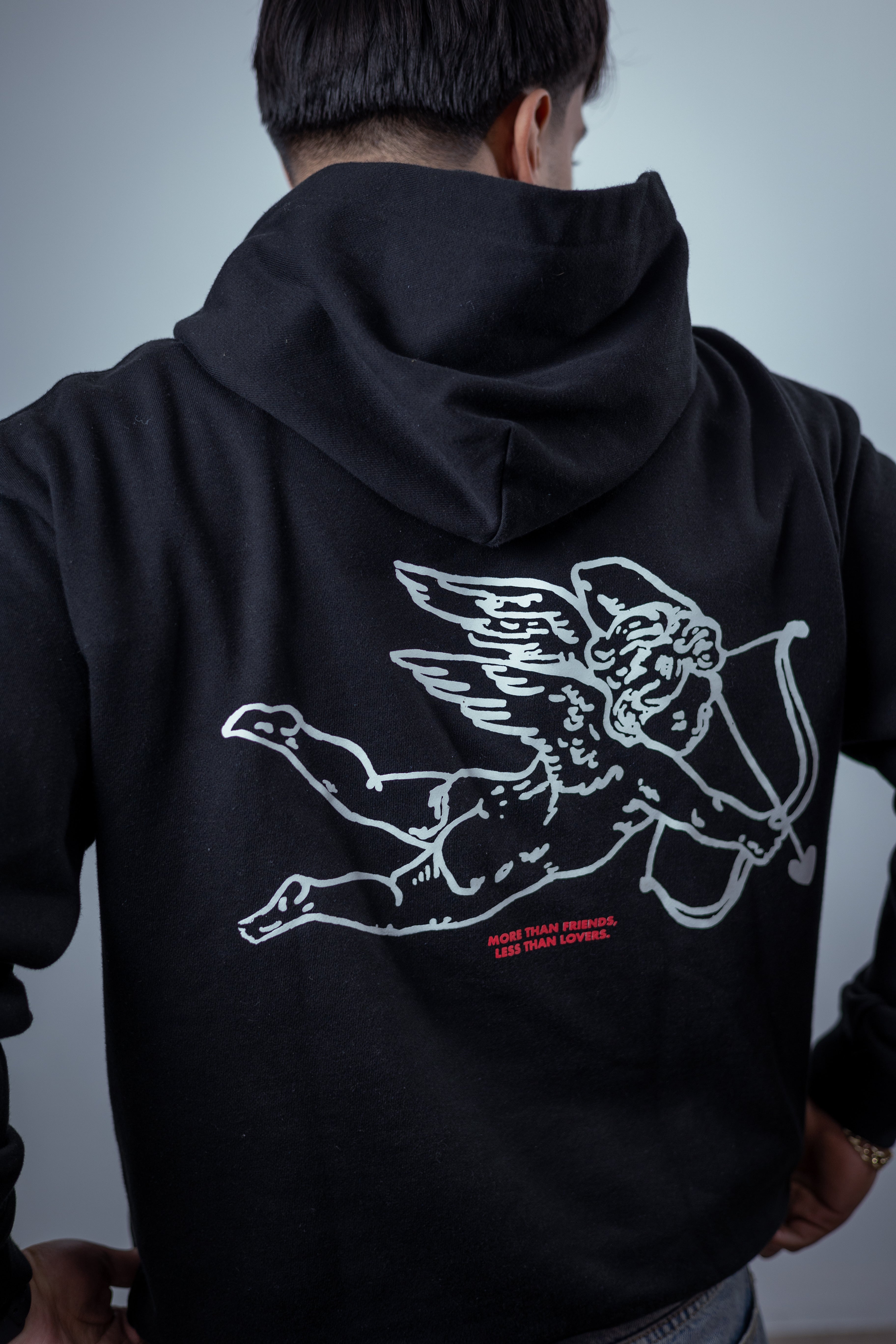 "MORE THAN FRIENDS, LESS THAN LOVERS" HOODIE